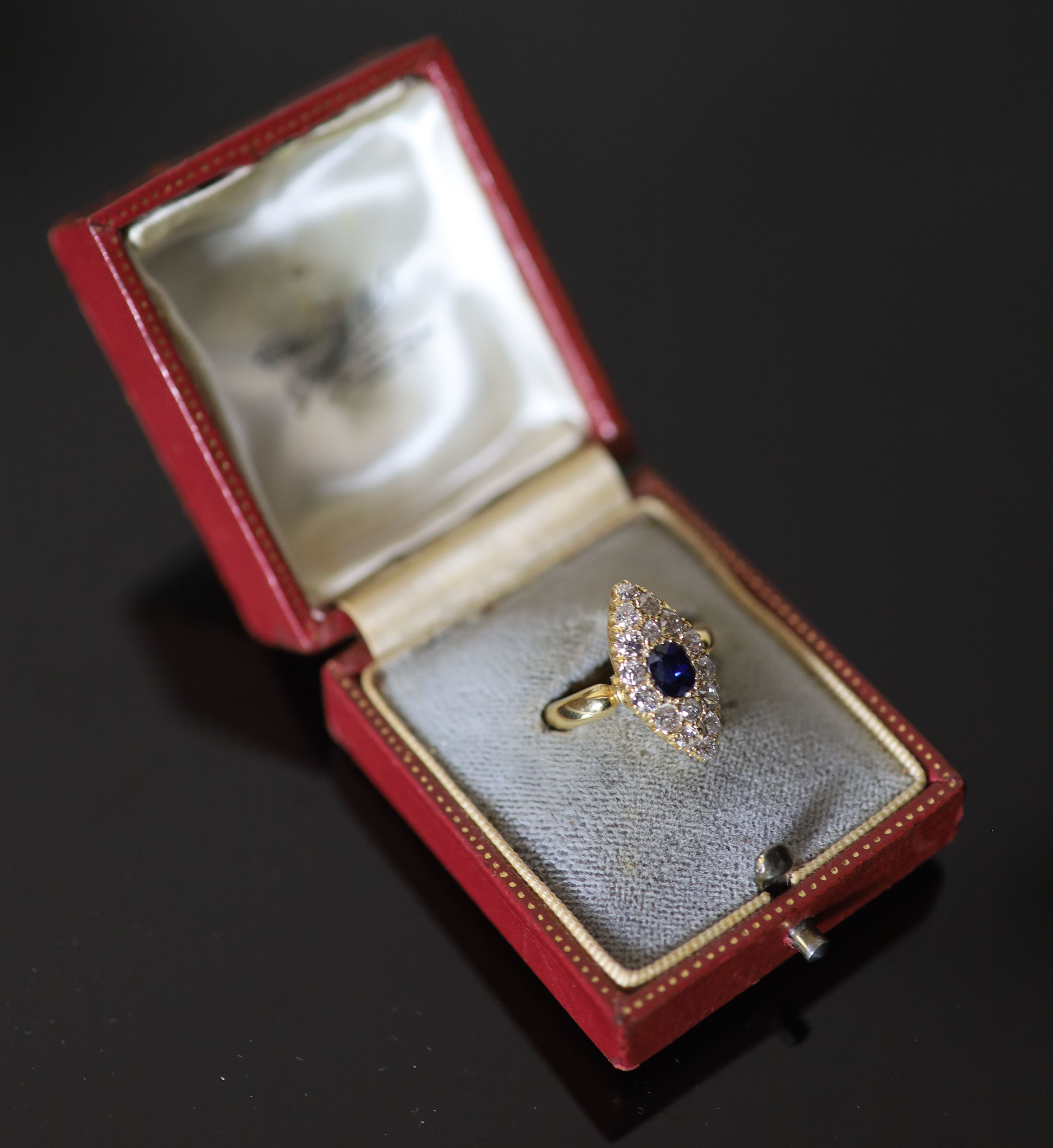 A Victorian 18ct gold, sapphire and diamond set marquise cluster ring,